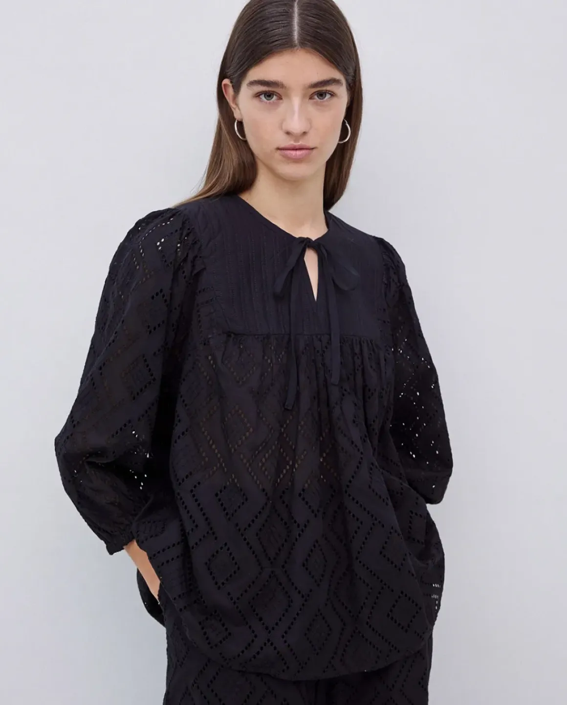 Blusa canesú acolchado negro