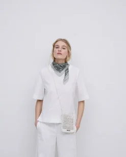 Blusa de popelín blanco