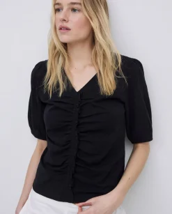 Camiseta detalle volante negro