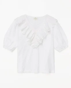Camiseta volante con bordado blanco