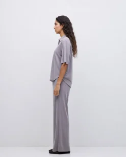 Pantalones punto fluidos gris