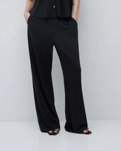 Pantalones punto fluidos negro
