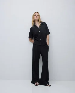 Pantalones punto fluidos negro