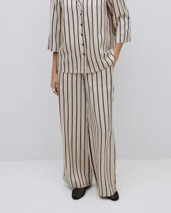 Pantalones wide leg tencel crudo