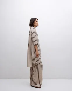 Pantalones wide leg tencel crudo