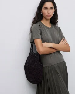 Vestido evasé falda plisada caqui