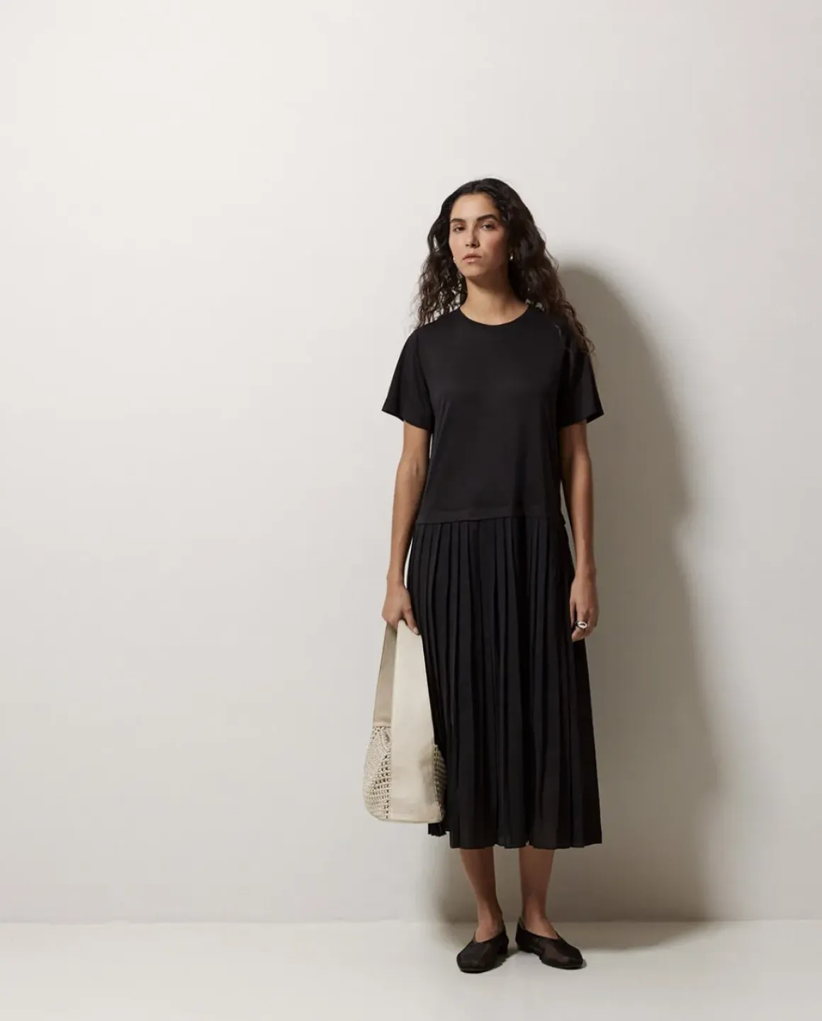 Vestido evasé falda plisada negro